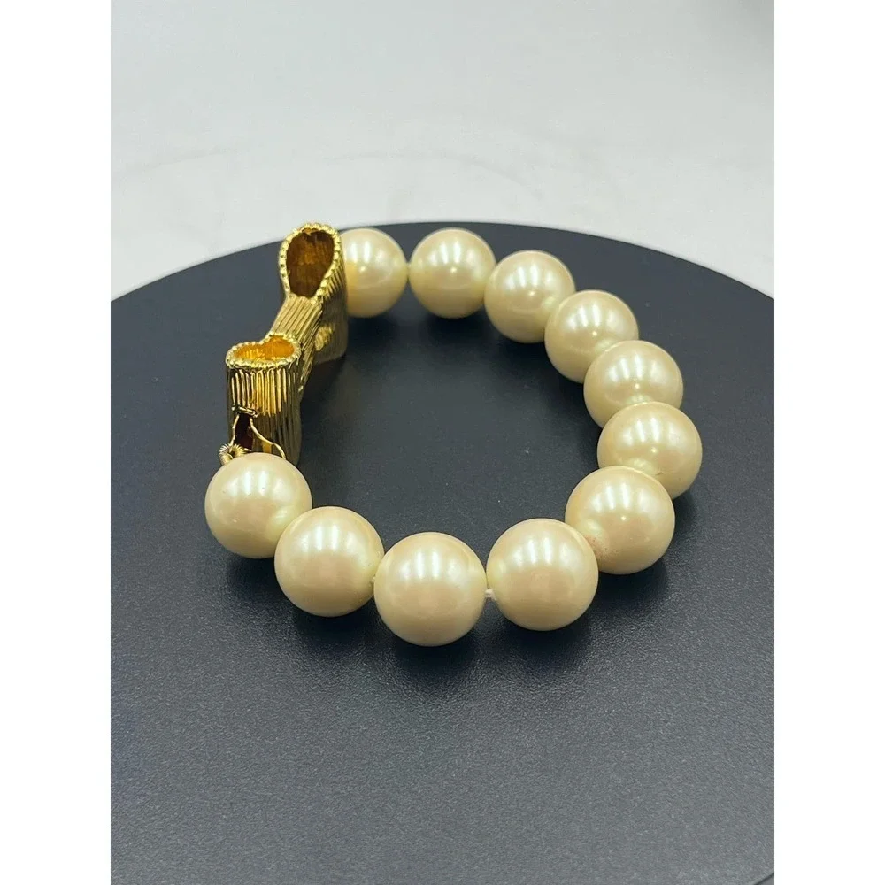 Kate Spade All Wrapped Up Pearl Gold Bow Bracelet‎